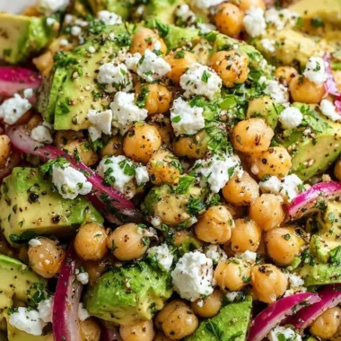 Colorful Chickpea Feta Avocado Salad in a bowl.