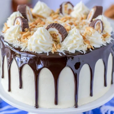 Delicious Almond Joy Layer Cake with chocolate, coconut, and almond layers.