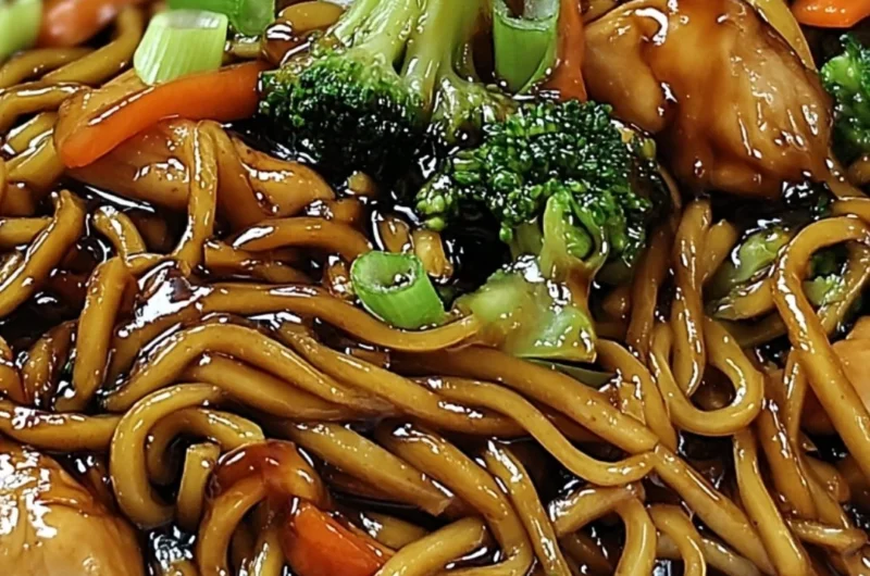 Extra Saucy Garlic Chicken Lo Mein dish with chicken, garlic, and noodles