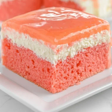 Delicious Hawaiian Guava Cake topped with fresh fruits and creamy frosting