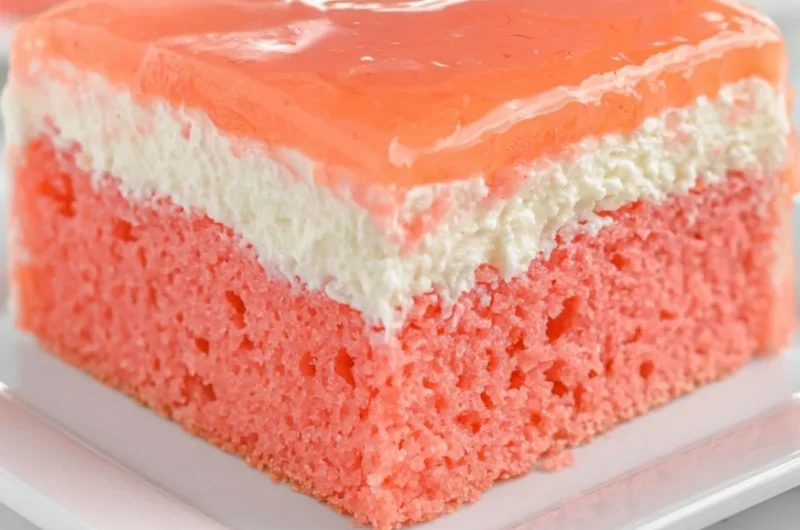 Delicious Hawaiian Guava Cake topped with fresh fruits and creamy frosting