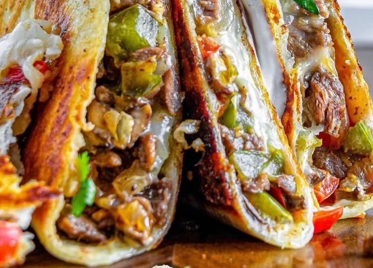 Philly Cheesesteak Quesadilla with melted cheese and grilled beef