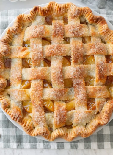 Homemade apple pie with golden crust and fresh apple filling