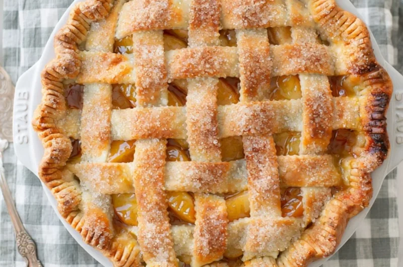 Homemade apple pie with golden crust and fresh apple filling