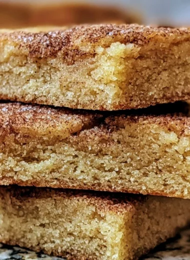 Delicious chewy Snickerdoodle cookie bars topped with cinnamon sugar