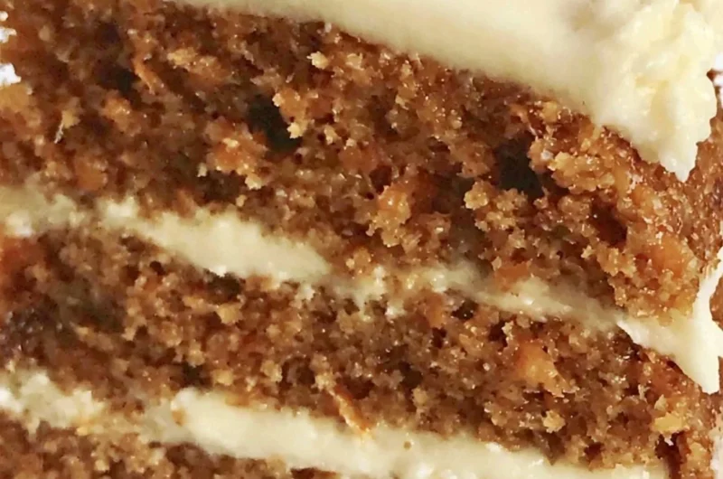 Classic carrot cake with cream cheese frosting and walnuts