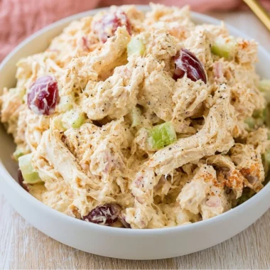 Delicious Cozy Cottage Cheese Chicken Salad served in a bowl with fresh ingredients.