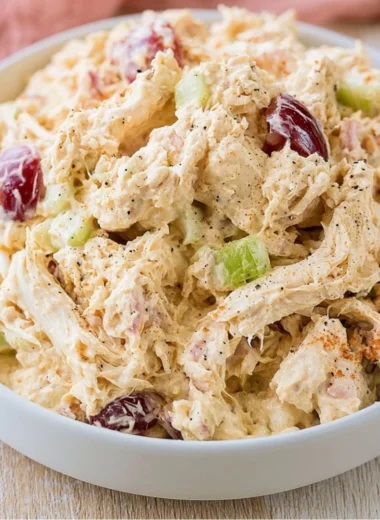 Delicious Cozy Cottage Cheese Chicken Salad served in a bowl with fresh ingredients.