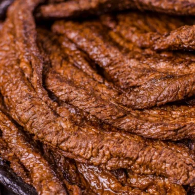 Juicy grilled beef steak served with aromatic herbs and spices.