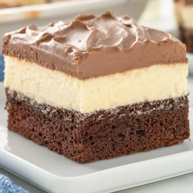 Cozy Italian Love Cake topped with powdered sugar on a rustic table