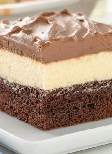Cozy Italian Love Cake topped with powdered sugar on a rustic table