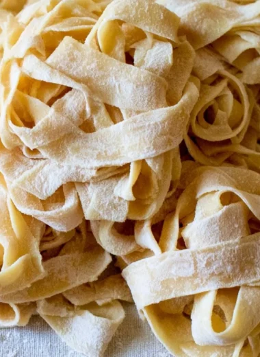 Deliciously cozy sourdough pasta dish garnished with fresh herbs