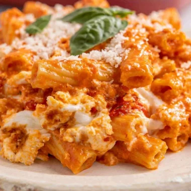 Cream Cheese Baked Ziti Vegetarian Casserole topped with cheese and herbs