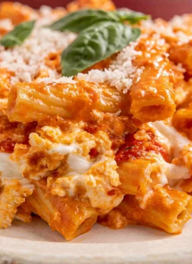 Cream Cheese Baked Ziti Vegetarian Casserole topped with cheese and herbs
