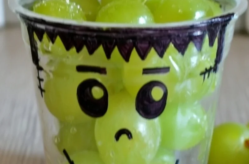 Colorful healthy Halloween snacks including fruits and vegetables