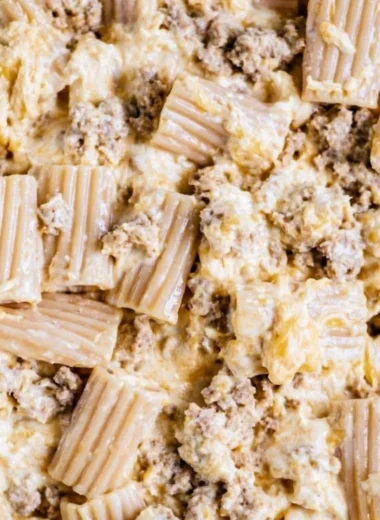 Delicious homemade cheeseburger pasta served in a bowl with cheese and herbs.