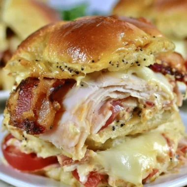 Delicious Kentucky Hot Brown Sliders served with melted cheese and toppings