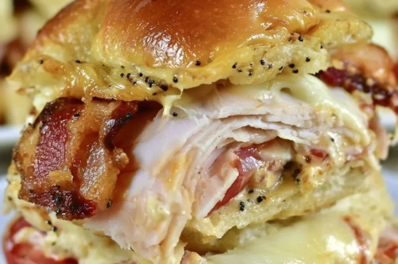 Delicious Kentucky Hot Brown Sliders served with melted cheese and toppings