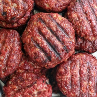 Delicious smoked burgers with savory toppings and grilled to perfection.