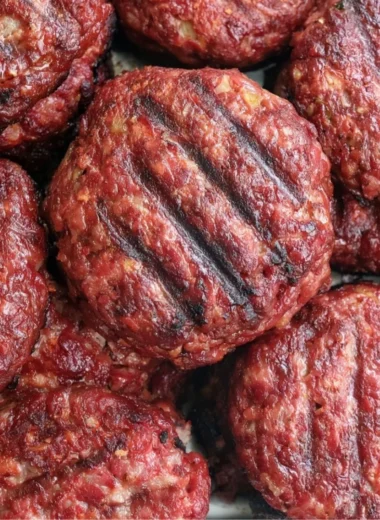 Delicious smoked burgers with savory toppings and grilled to perfection.