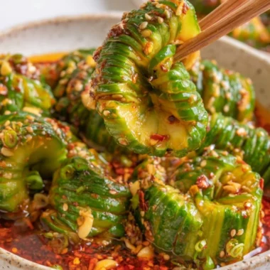 Fresh Spicy Asian Cucumber Salad with vibrant ingredients and spices.