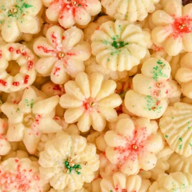 Cozy buttery spritz cookies on a festive plate