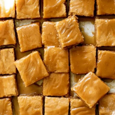 Delicious cozy maple blondies drizzled with maple glaze