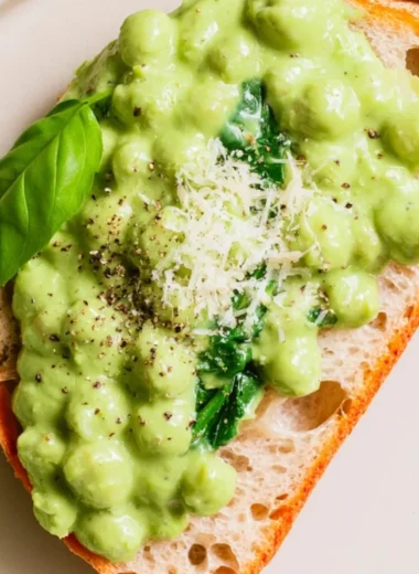 Creamy high protein pesto chickpeas served in a bowl