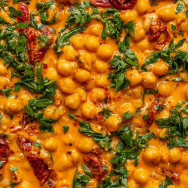 Delicious Marry Me Chickpeas served in a bowl, showcasing vibrant ingredients.