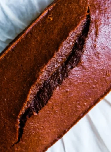 Delicious gingerbread cake loaf topped with icing and spices